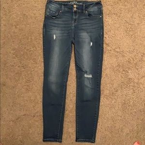 Dark Blue jeans with small rips